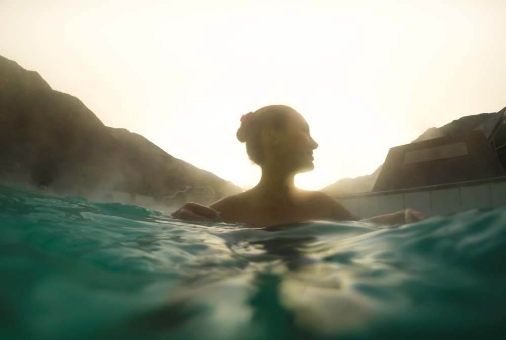 Gil Swimming And Relaxing In A Outdoor Spa Swimming Pool During Sunset In A Relaxed Christmas Vacations On The Catalan Pyrenees.