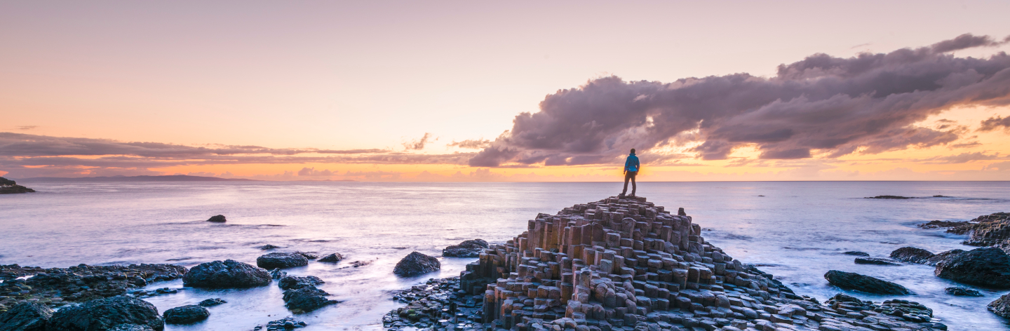 Tourist At The Giant's Causeway, Northern Ireland.