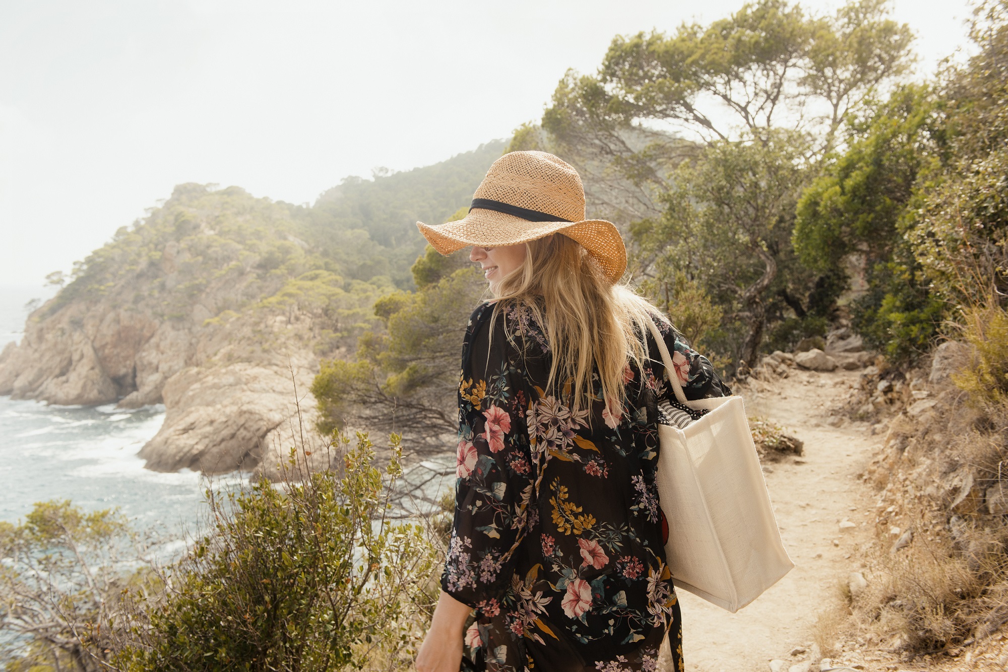 Woman Walking Along Coastal Pathway, Rear View, Tossa De Mar, Catalonia, Spain