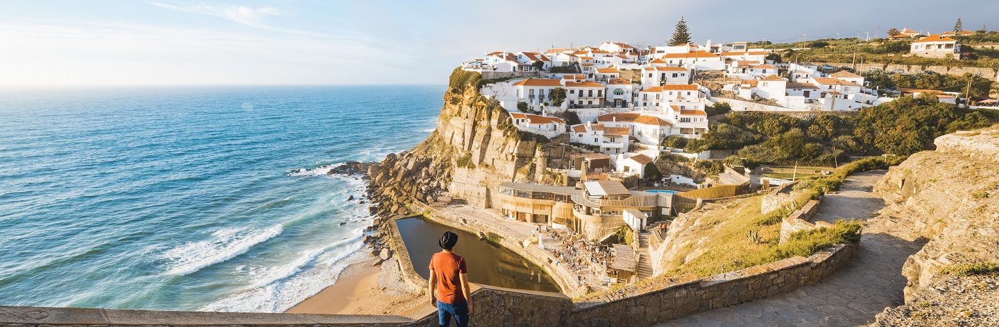 Tourist Admiring The View In Azenhas Do Mar, Lisbon