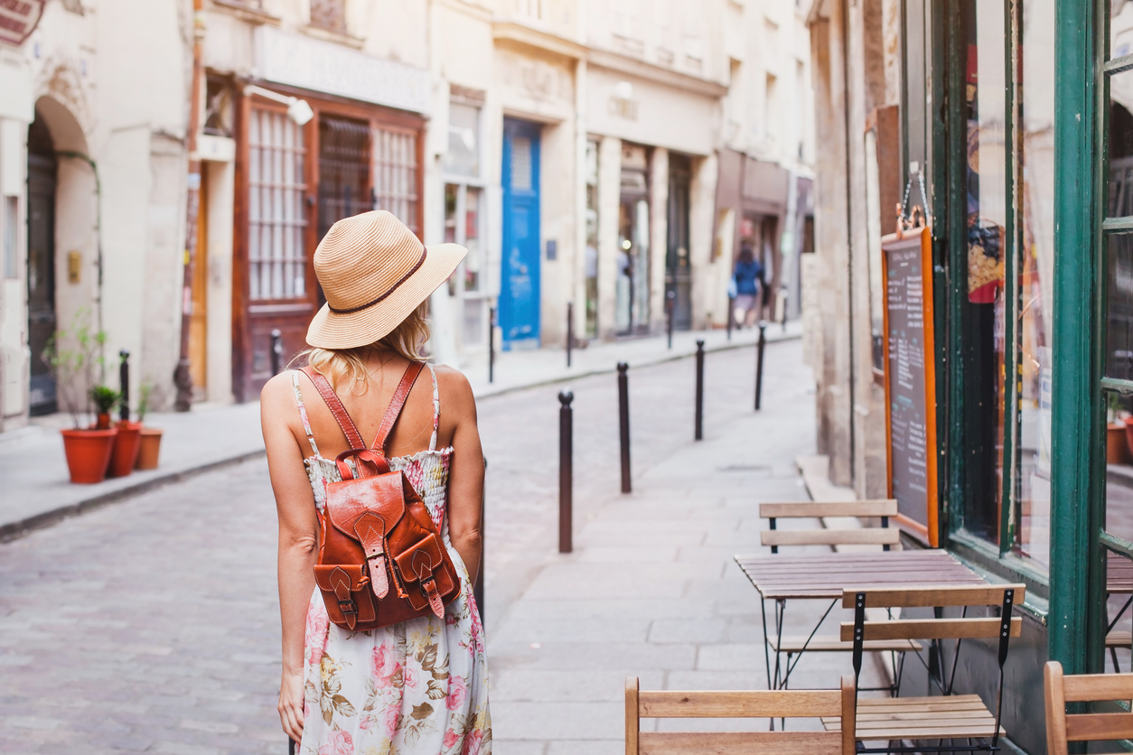 Woman Tourist On The Street Traveling In Europe